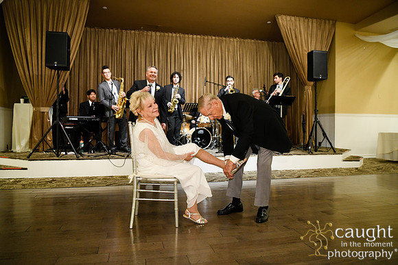 046 474 Rasmussen Wedding - Bouquet and Garter Toss